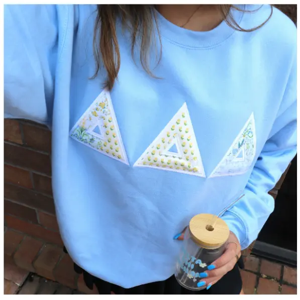 Alpha Omicron Pi Patchwork Gold-Trimmed Crewneck 1