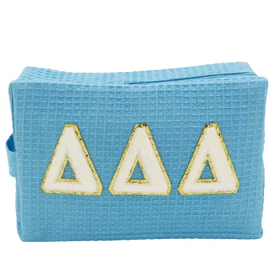 Delta Delta Delta Waffle Texture Makeup Bag – Chenille Greek Letters 1